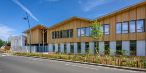 Caissons de toiture en poutres en I à membrures bois et âme métallique