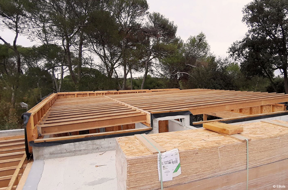 LA TOITURE EN POUTRES EN I D'UNE MAISON MARIANT BOIS ET BÉTON Portail — free download