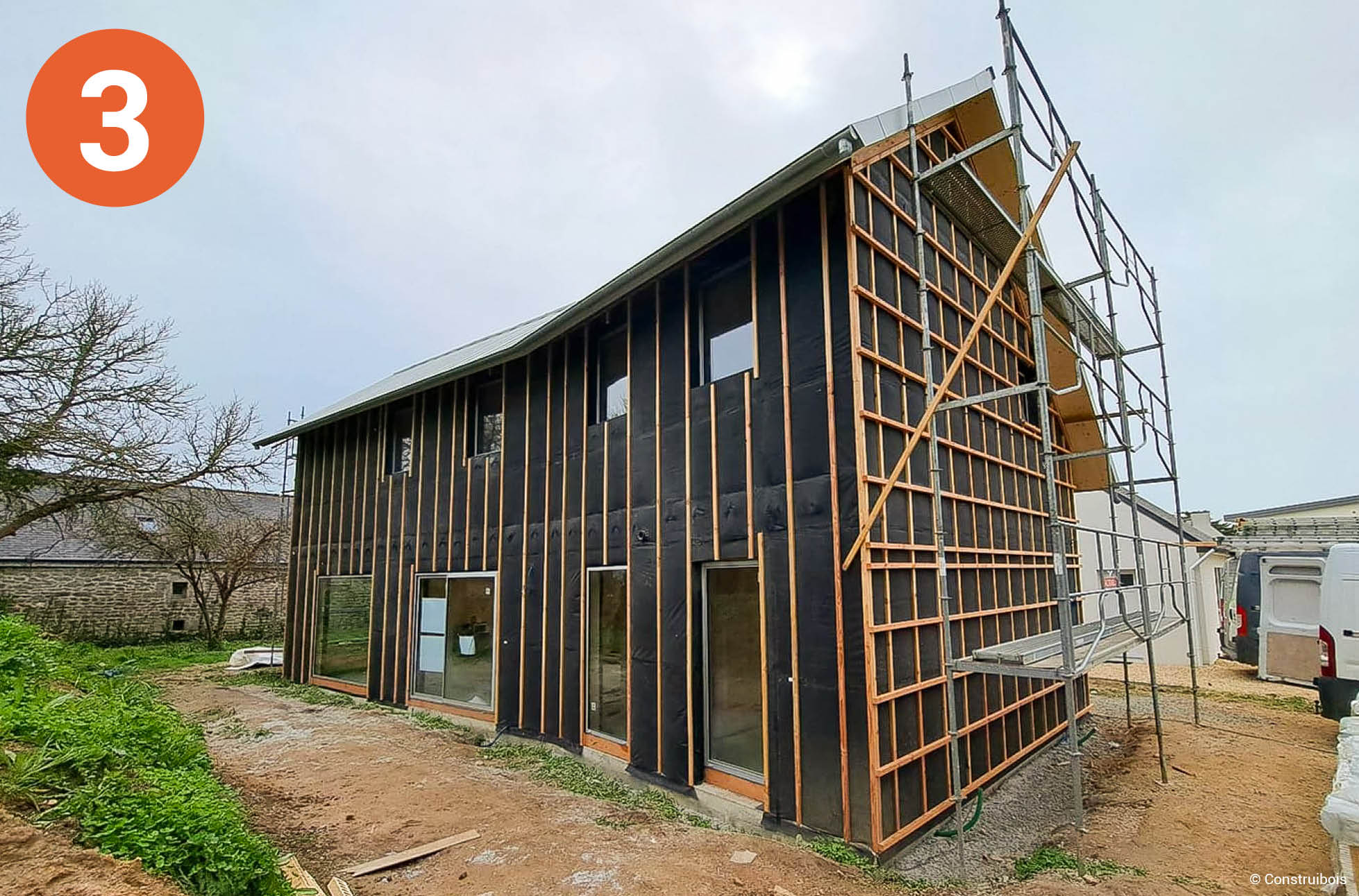 Maison passive en CLT à enveloppe en poutres en I et isolation ouate de cellulose